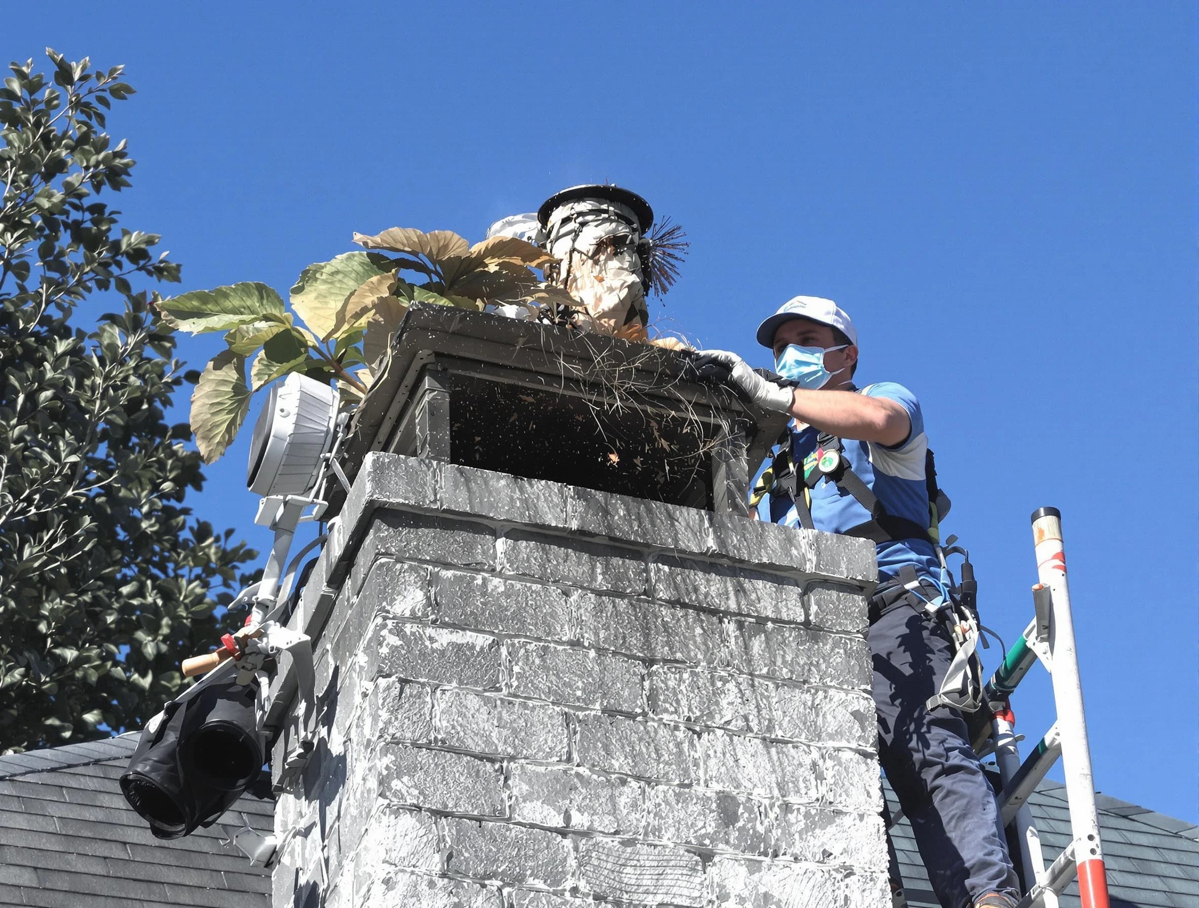 Pemberton Chimney Sweep specialist performing chimney cleaning in Pemberton, NJ